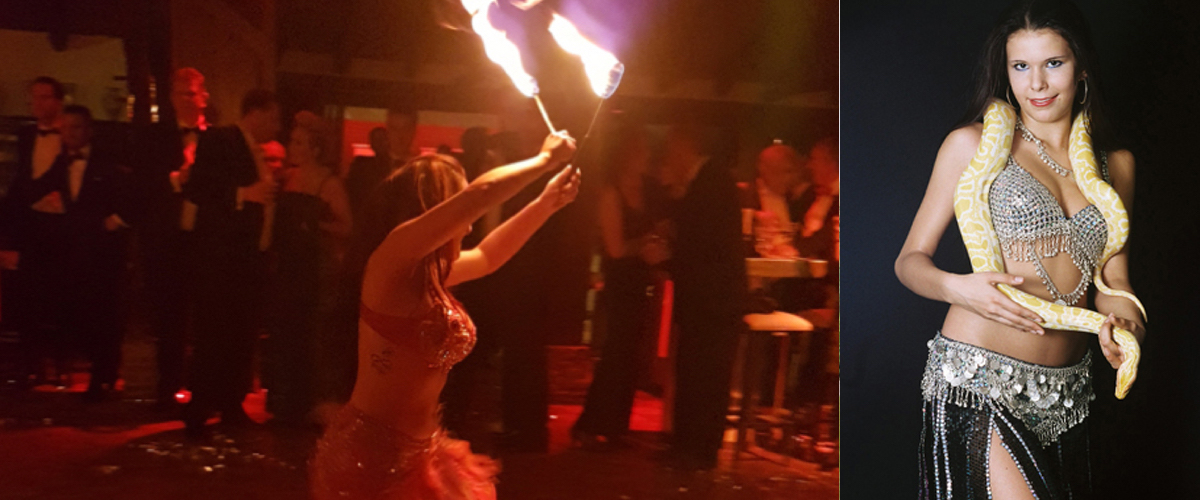 Slangenbezweerder en meerdere buikdanseressen